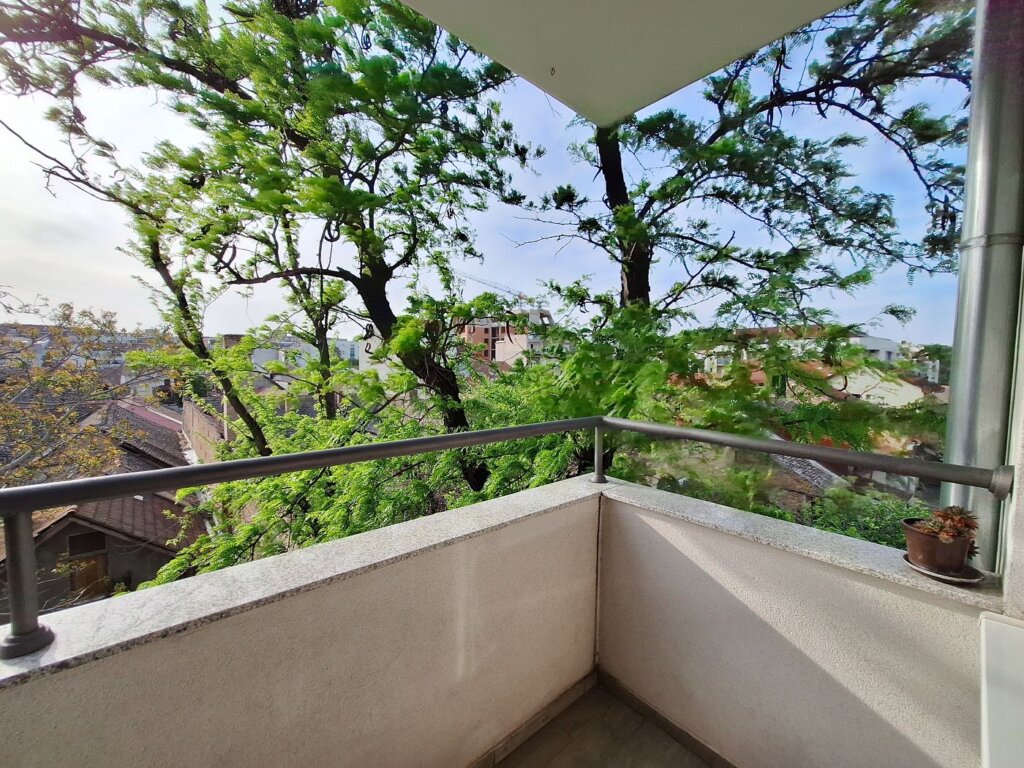 balcony digital nomad apartment Novi Sad accommodation in Serbia city downtown greenery trees