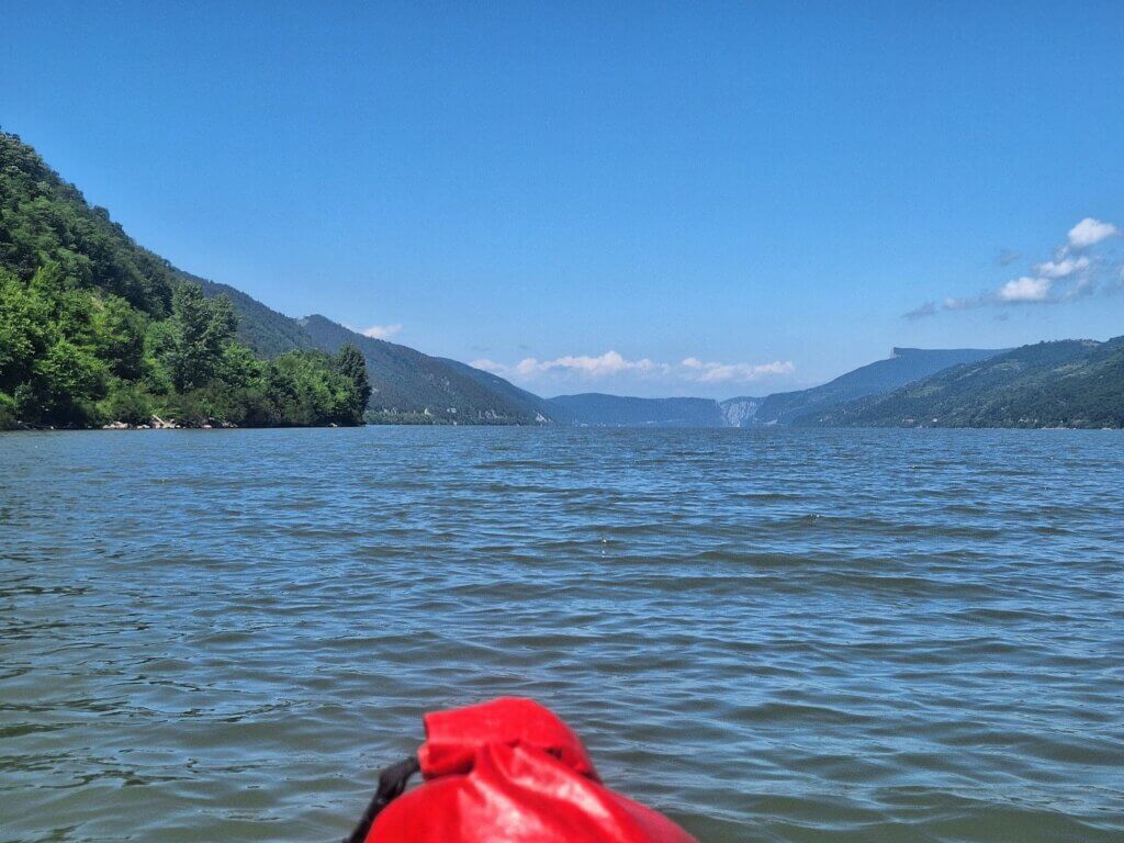 Romania Serbia border Danube River kayaking Svinita Donji Milanovac to Dubova Cazanele Veliki Kazan Klisura Gorge Great Kazan Gorge vista Miroc Strbac peak vista cliffs rock