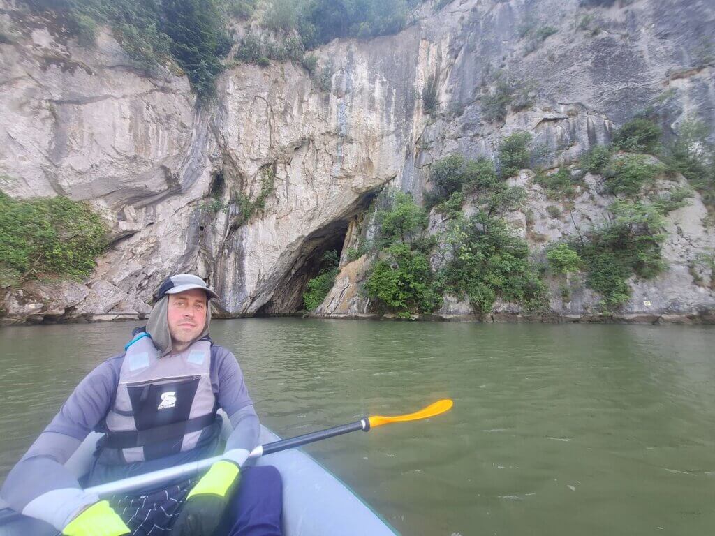 Jonas kayaking border of Romania Serbia Ponicova Cave Cazanele Mari Veliki Kazan Klisura Gorge Great Kazan Gorge