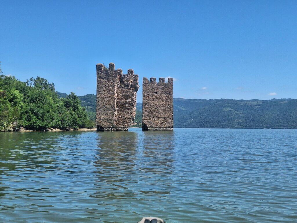 Trikule Tricule sunken drowned fortress Cetatea Romania Danube River Iron Gate I Dam kayak view May paddling Serbia border