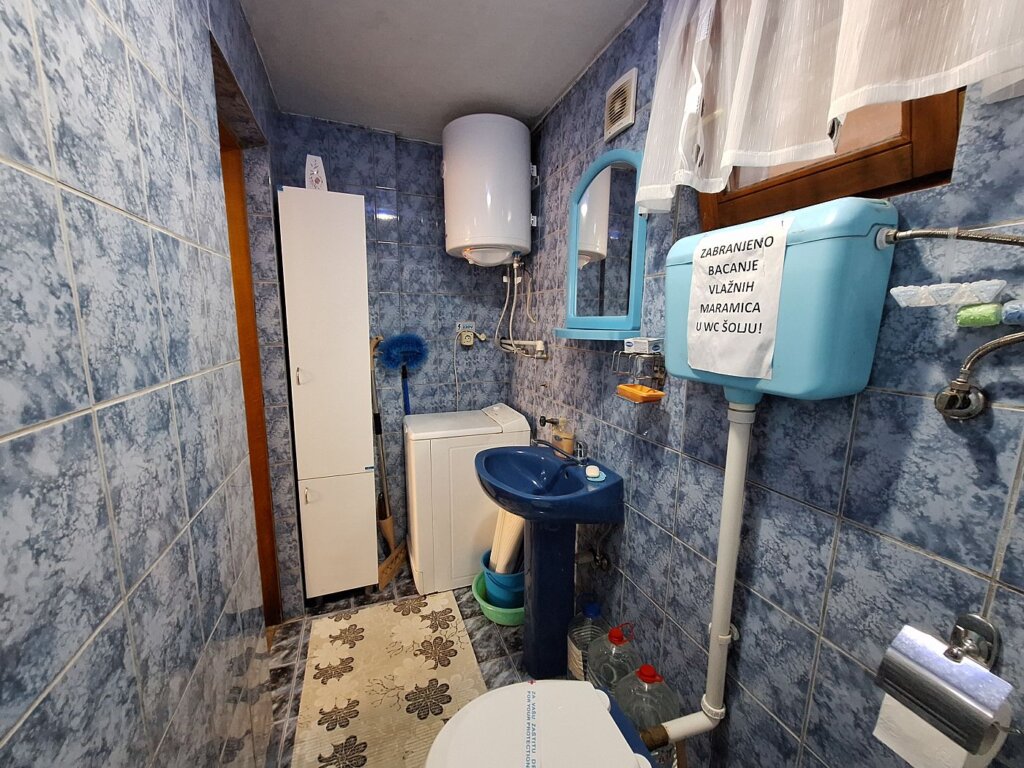 Aleksandar Apartments and rooms Golubac Fortress bathroom washing machine Serbia travel