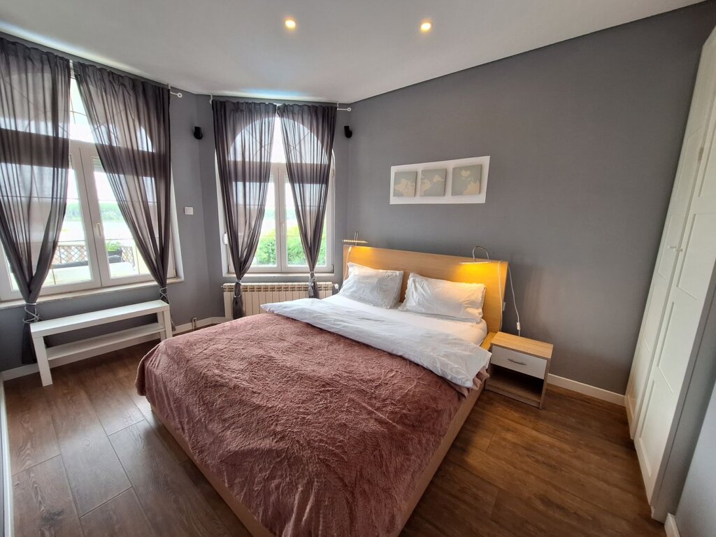 bedroom accommodation in Serbia Novi Banovci stylish home bed guesthouse Booking apartment beautiful Danube views