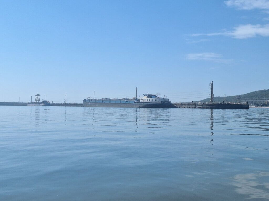 waiting area inland shipping ships cargo Iron Gate I dam lock Derdap I Portile de Fier I shipping canal Danube River Romania Serbia Sip Gorge traffic mooring