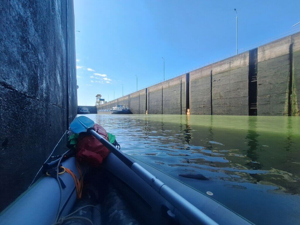 wet sluice lock descend in kayak Iron Gate I dam Zucchini paddling Danube River German Corina Hamburg inland shipping Serbian ship