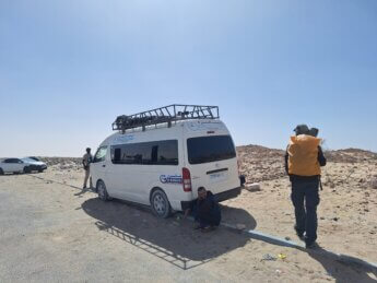 through the berm El Moussavir traveler Hiace minivan bus travel Morocco Western Sahara Wall no man's land journey to Mauritania Nouadhibou Nouakchott