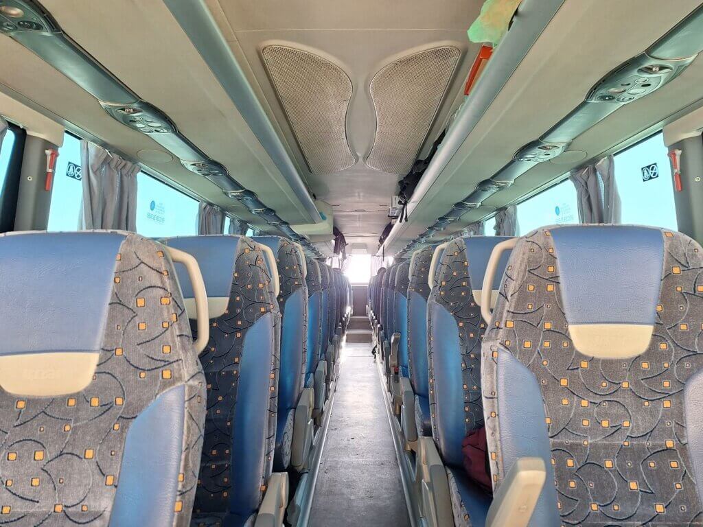 interior of CTM bus in El Argoub Western Sahara coach travel to Guerguerat break