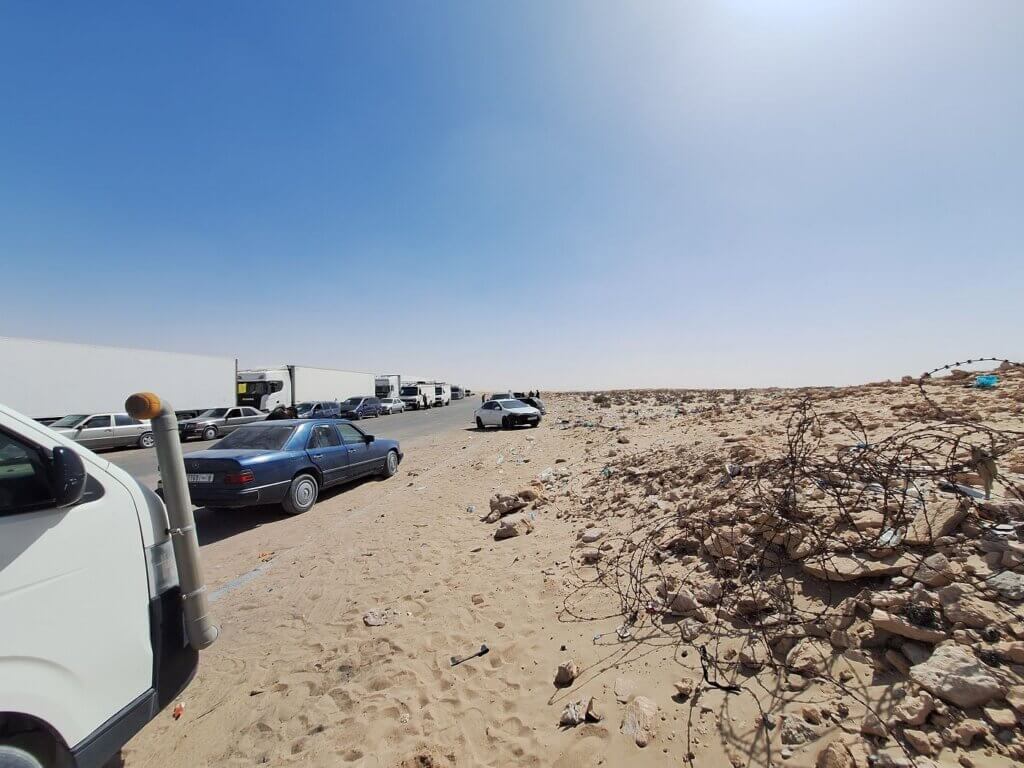 traffic jam at the Moroccan side entry from no man's land the berm barbed wire Western Sahara occupation Polisario fighting protest 2025 Mauritania