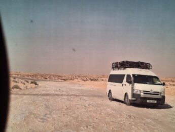 end of the paved asphalted road no man's land between Morocco and Mauritania Western Sahara berm wall