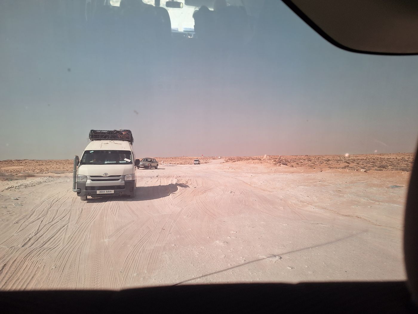 long drive through no man's land El Moussavir bus van hiace unpaved road bumpy journey Mauritania Western Sahara border