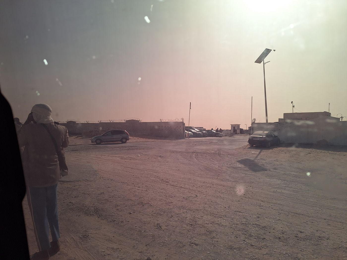 truck impound Mauritania border with Western Sahara Morocco desert sunshine hot February hopeless