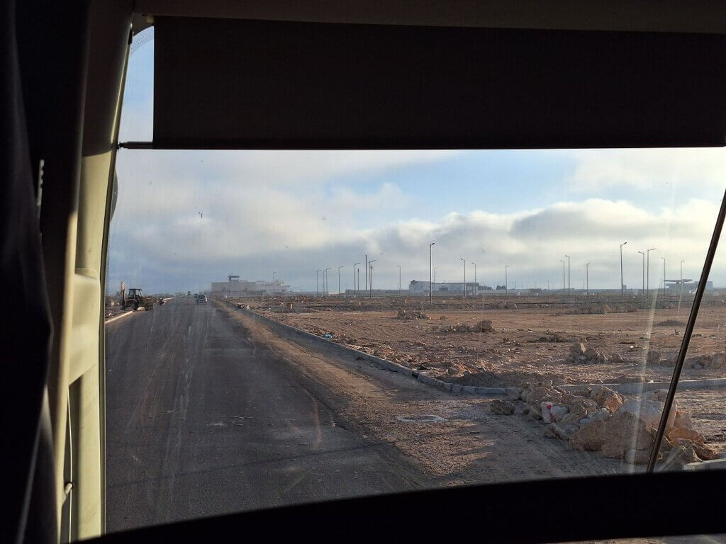 Dakhla new built city construction street lamps roads no buildings dystopian