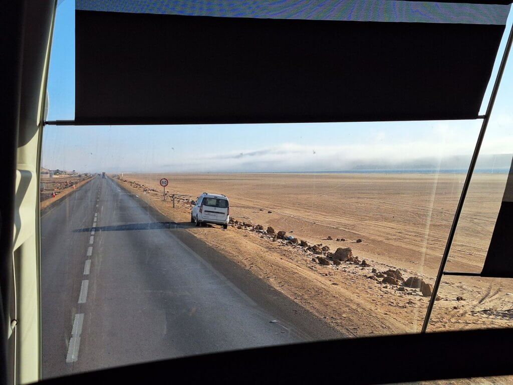 Dakhla lagoon kitesurfing as seen from the Supratours CTM bus travel to Guerguerat Border Morocco Mauritania