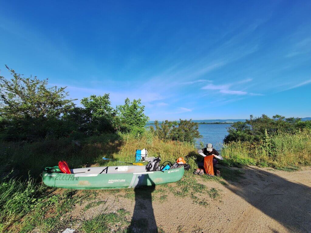 launch spot Crivina morning kayaking Danube River Romania Serbia to Iron Gate II hydroelectric power plant dam
