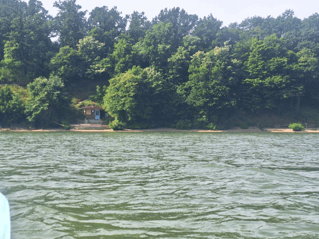 kayaking Danube near Crivina Izvoru Frumos Romania fishing hut river
