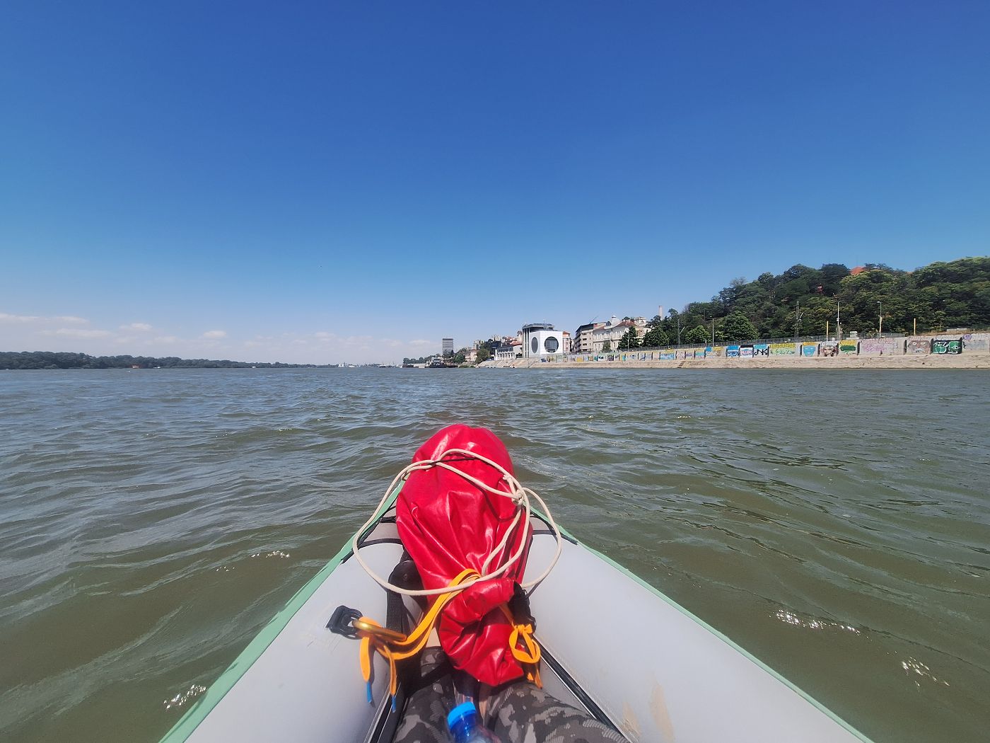 overview of Ruse Bulgaria western port cranes cityscape Danube River kayaking inflatable