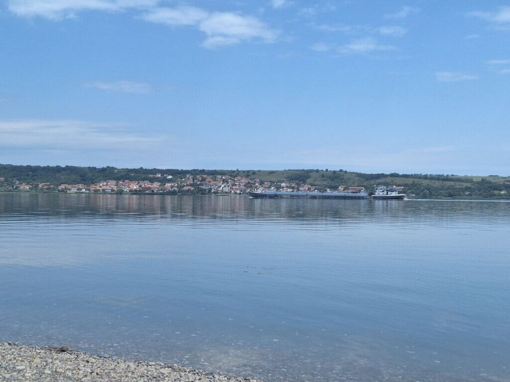 Vajuga Serbia Danube River as seen from Romania Vrancea ship pushtow cargo wake