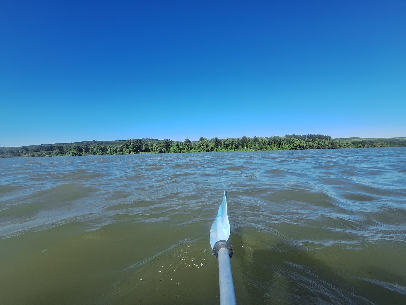 wind and waves on the Danube choppy water tailwind kayaking near Tsar Simoneovo Botevo Bulgaria