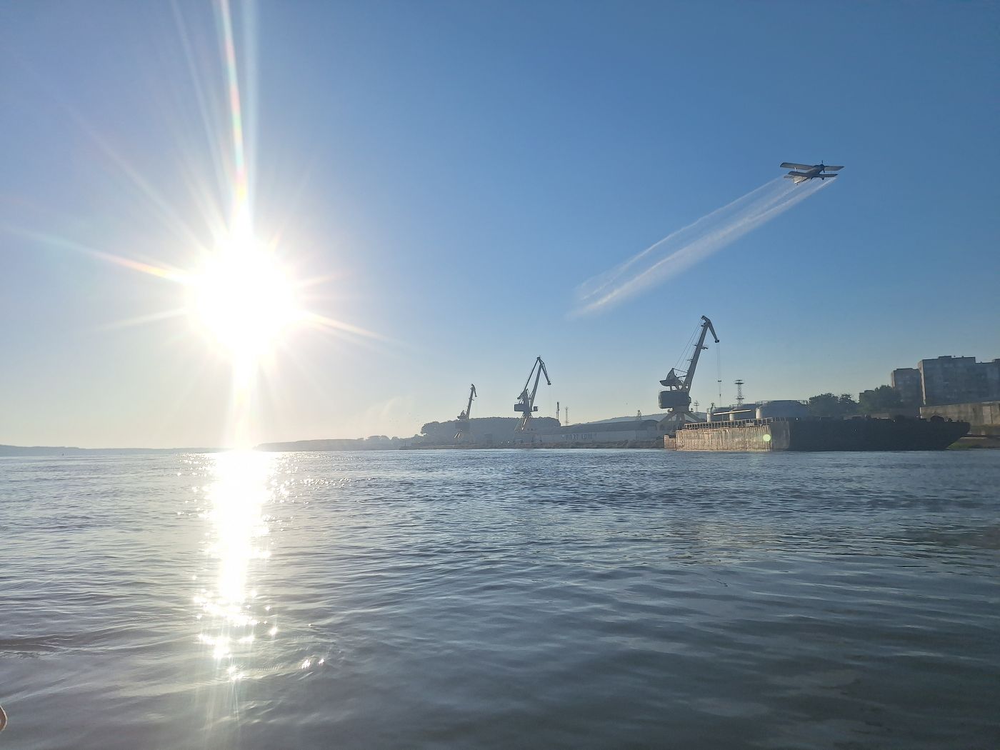 insecticide crop duster plane Lom Bulgaria airplane Danube River crickets port harbor cranes