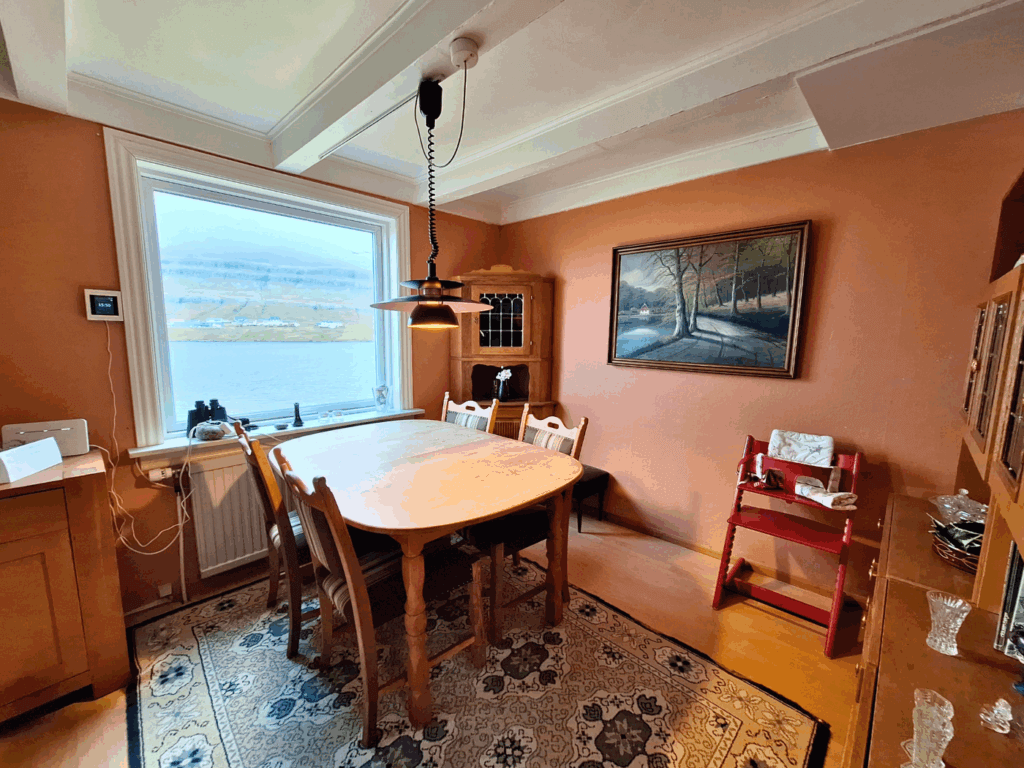 living room Trongisvagur Suduroy desk table digital nomad travel to the Faroe Islands fjord view lovely house Tvoroyri