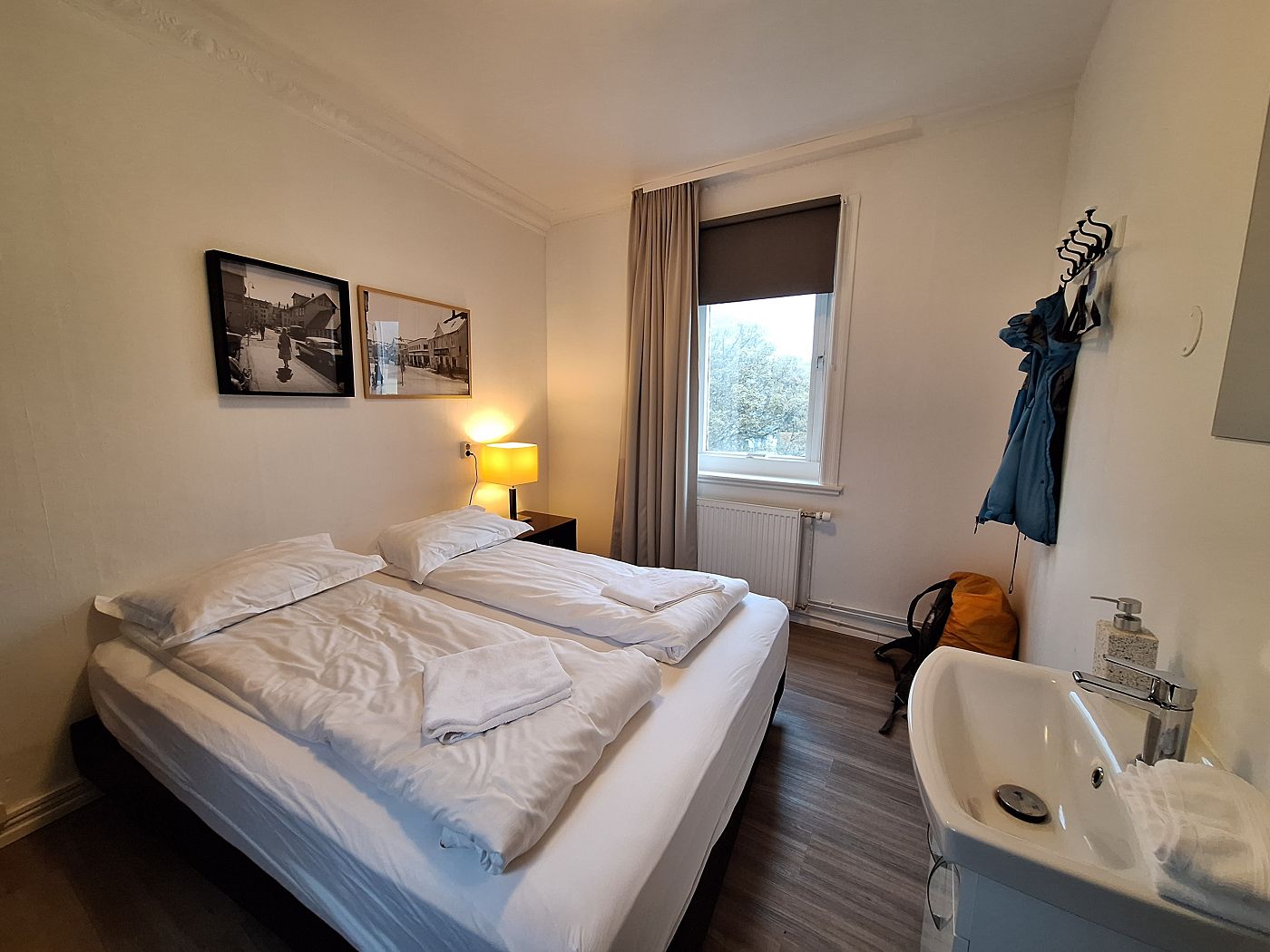 Old Town Reykjavik hotel guest house room double bed sink shared bathroom