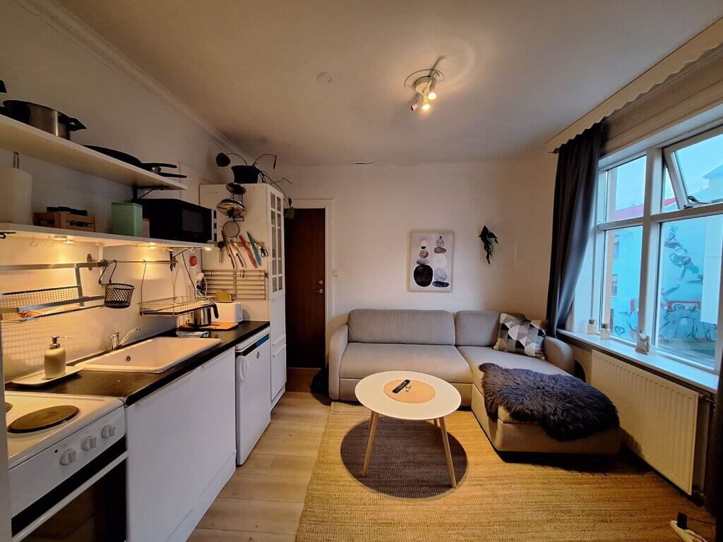 living room kitchen studio Airbnb Reykjavík accommodation in Iceland shared facilities