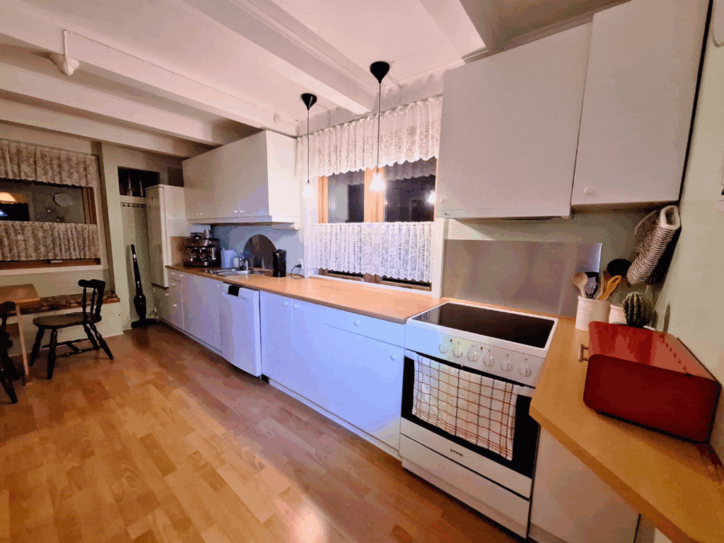 kitchen airbnb Suduroy Faroe Island spacious well-equipped group travel couple trip dishwasher oven stove