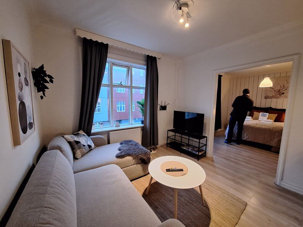 Airbnb in Reykjavík accommodation in Iceland couch smart tv area relaxation netflix coffee table
