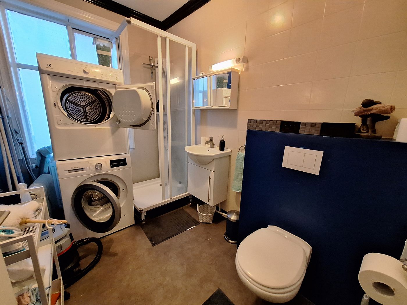 airbnb in Reykjavik shared bathroom washing machine shower toilet sink dryer accommodation in Iceland