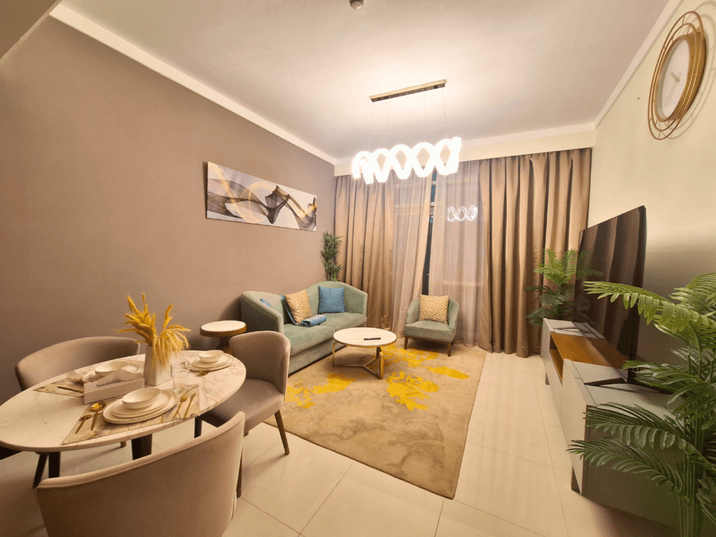 Accommodation in Bahrain Manama Al Fateh living room serviced apartment dining table tv couch